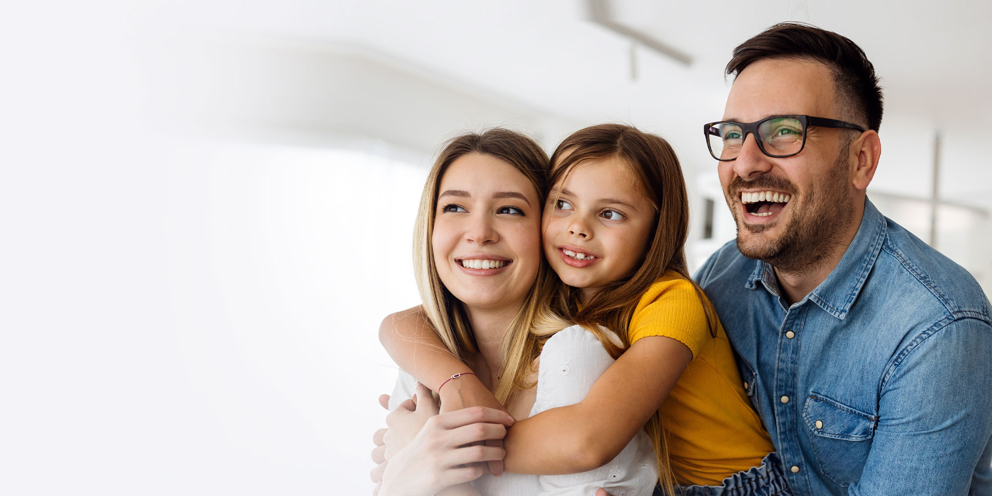 family smiling after dental checkup