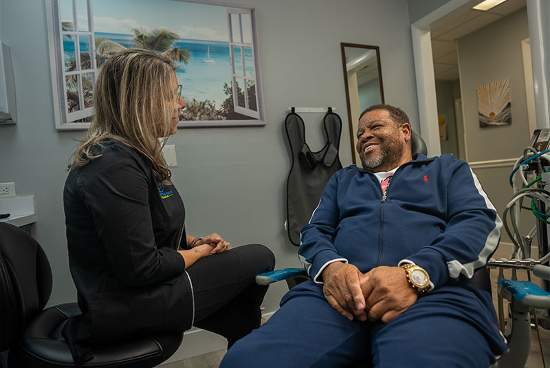 Dr. Franco talking with patient