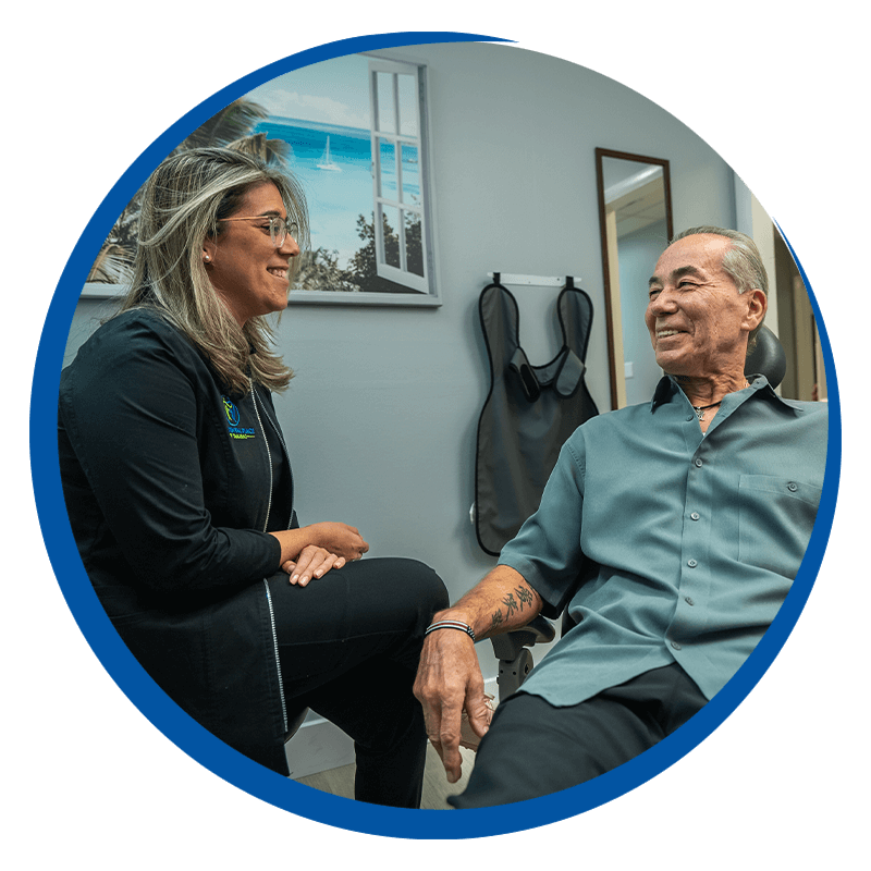 Dr. Franco consulting with patient