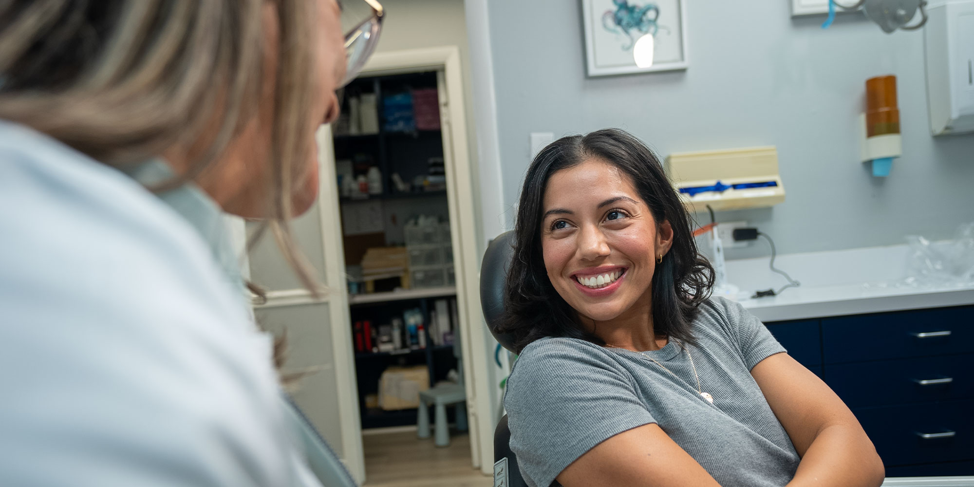 patient smiling showing off new veneers